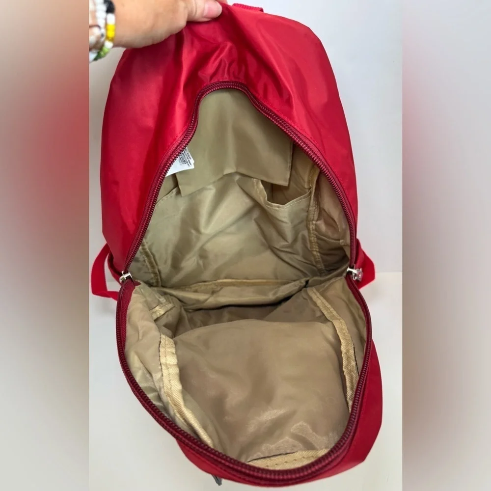 PAQ vibrant red backpack in like new condition